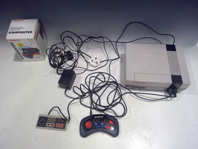 Lot 23 - A vintage Nintendo Entertainment System. It...