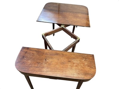 Lot 436 - A late George III mahogany concertina action dining table.