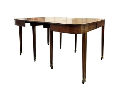 Lot 436 - A late George III mahogany concertina action dining table.