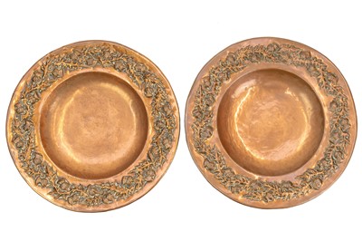 Lot 119 - A pair of Scottish arts and crafts copper chargers.