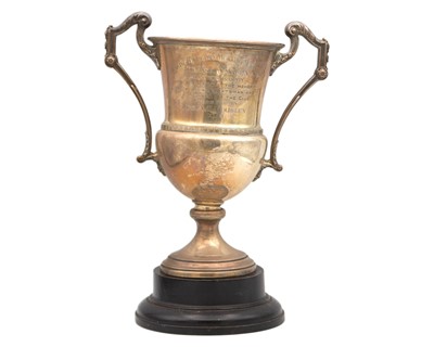 Lot 191 - A large silver trophy cup with a stand.