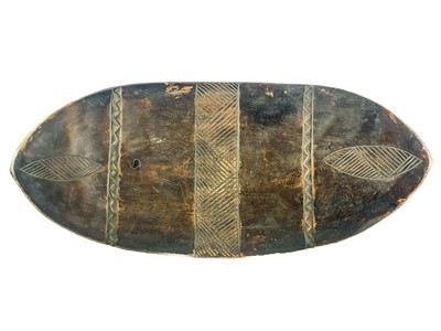 Lot 57 - An African hardwood zoomorphic stool.
