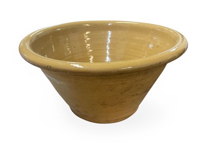 Lot 240 - A stoneware dairy bowl.