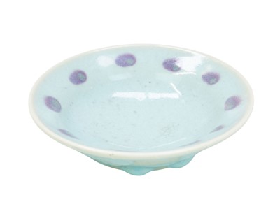 Lot 645 - A Chinese Jun type shallow bowl.