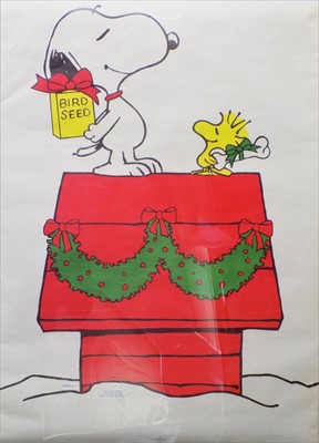Lot 184 - A Christmas themed Snoopy poster after Charles...