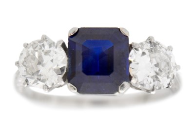 Lot 8 - A superb natural Burmese sapphire and diamond three-stone ring