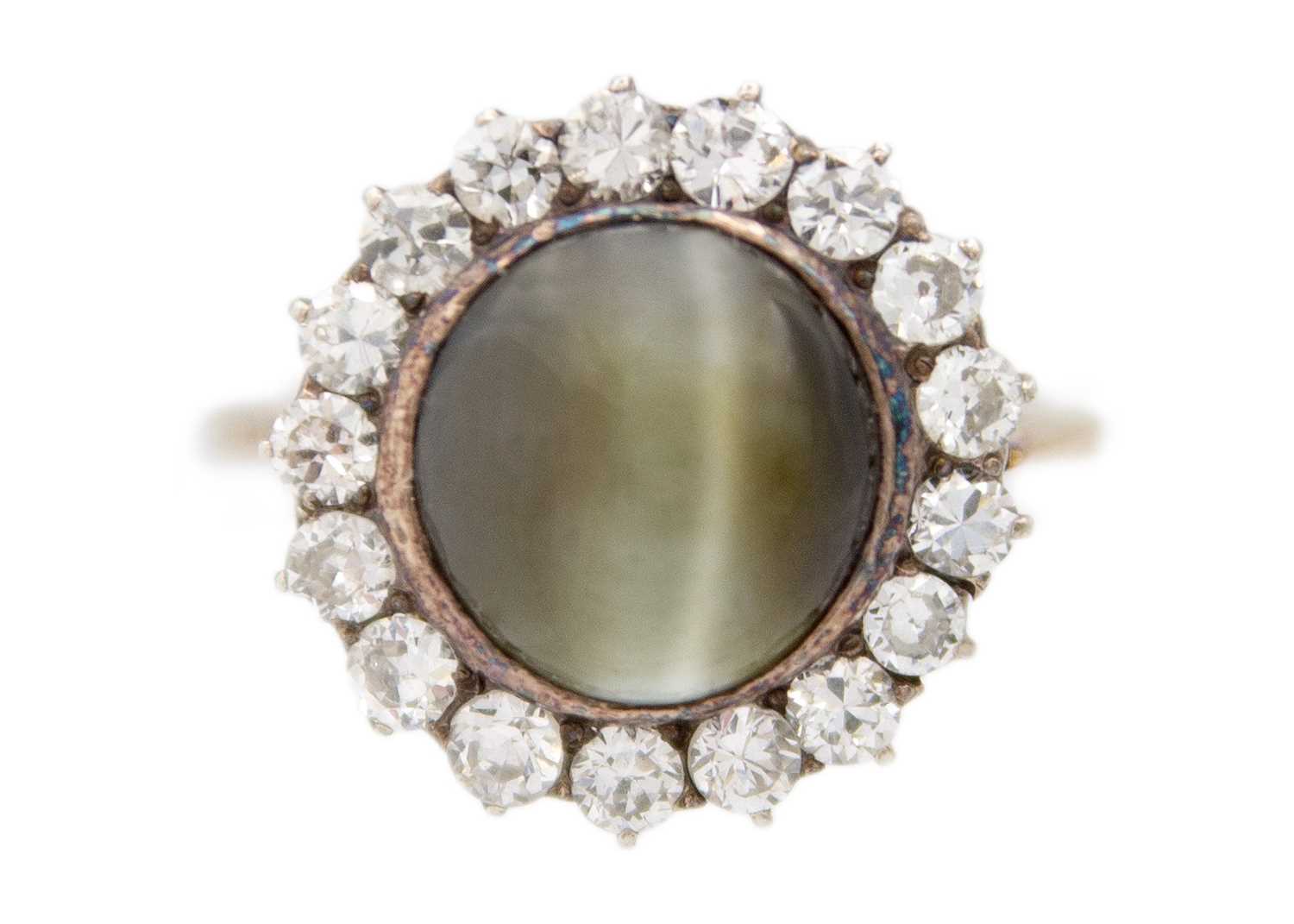 Lot 1 - A late Victorian cat's eye chrysoberyl and diamond halo yellow gold ring.