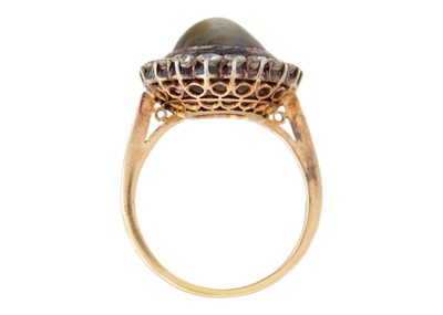 Lot 1 - A late Victorian cat's eye chrysoberyl and diamond halo yellow gold ring.