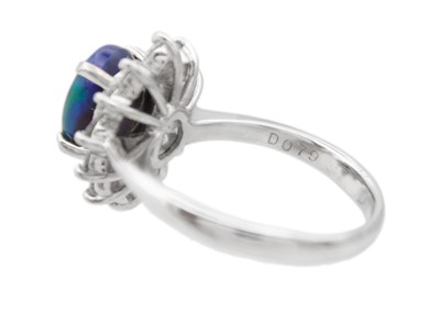 Lot 7 - A good black opal diamond ring, set in platinum.