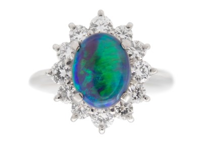 Lot A precious black opal diamond ring