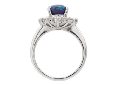 Lot 7 - A good black opal diamond ring, set in platinum.