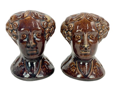 Lot 230 - A pair of early Victorian treacle glaze sash window stops.