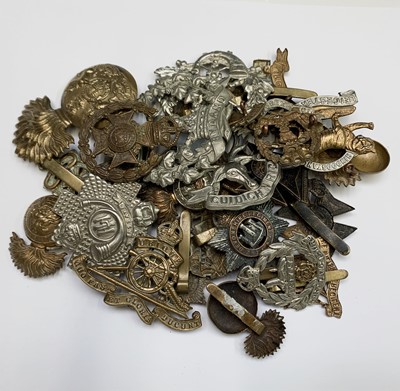 Lot 285 - CAP BADGES. A bag containing 28 British...