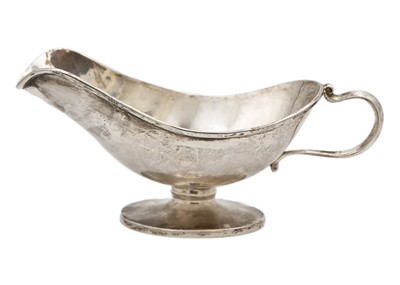 Lot 207 - A silver gravy jug.