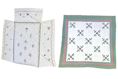 Lot 286 - A handsewn and embroidered single quilt with valance.