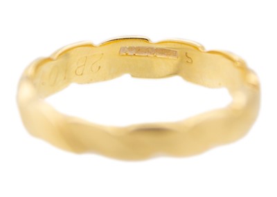 Lot 75 - An 18k band ring of a plaited design.