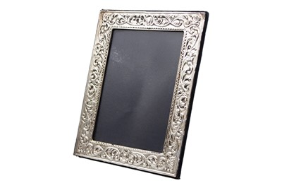 Lot 285 - A pair of modern Victorian-style silver-mounted photo frames.