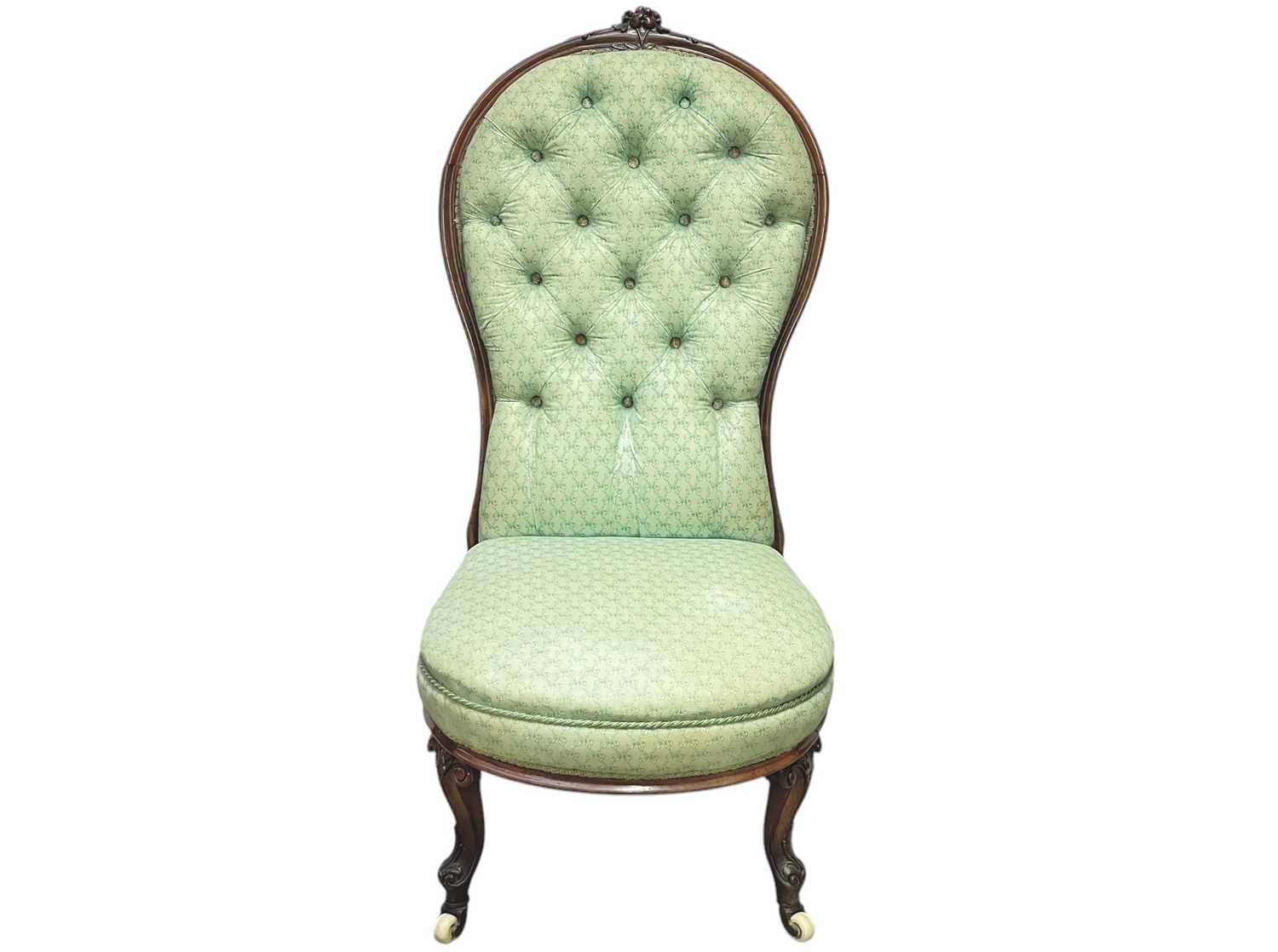 Lot 497 - A Victorian rosewood framed nursing chair.