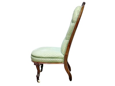 Lot 497 - A Victorian rosewood framed nursing chair.