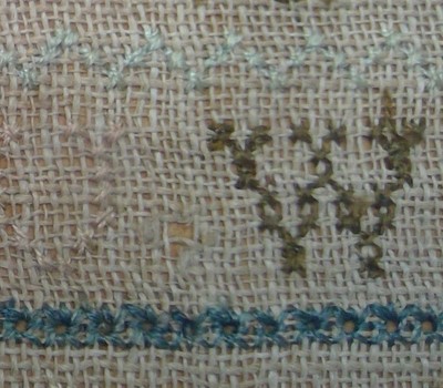 Lot 3008 - An 18th century needlework alphabet sampler...