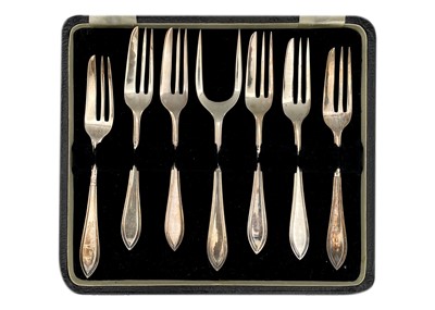 Lot 298 - A boxed set of six silver cake forks with serving fork by Purcell Brothers