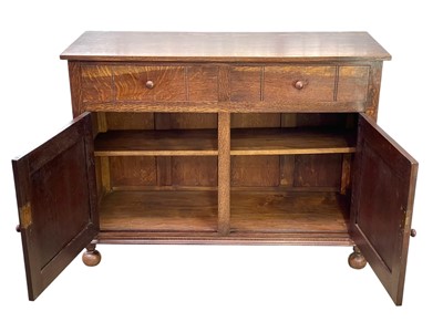 Lot 241 - A Heal's oak sideboard.