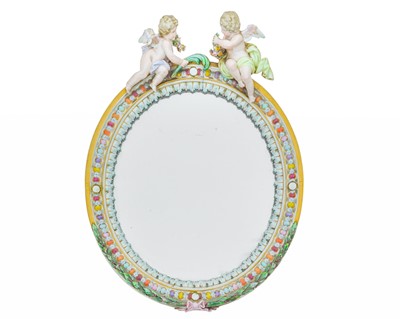 Lot 202 - A Meissen oval porcelain easel mirror.