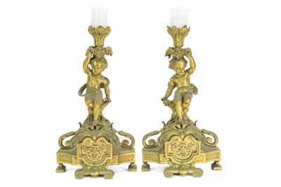 Lot 376 - A French ormolu clock garniture.