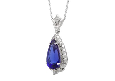 Lot 111 - An impressive pear-shaped Tanzanite pendant necklace in 18K white gold with diamonds.