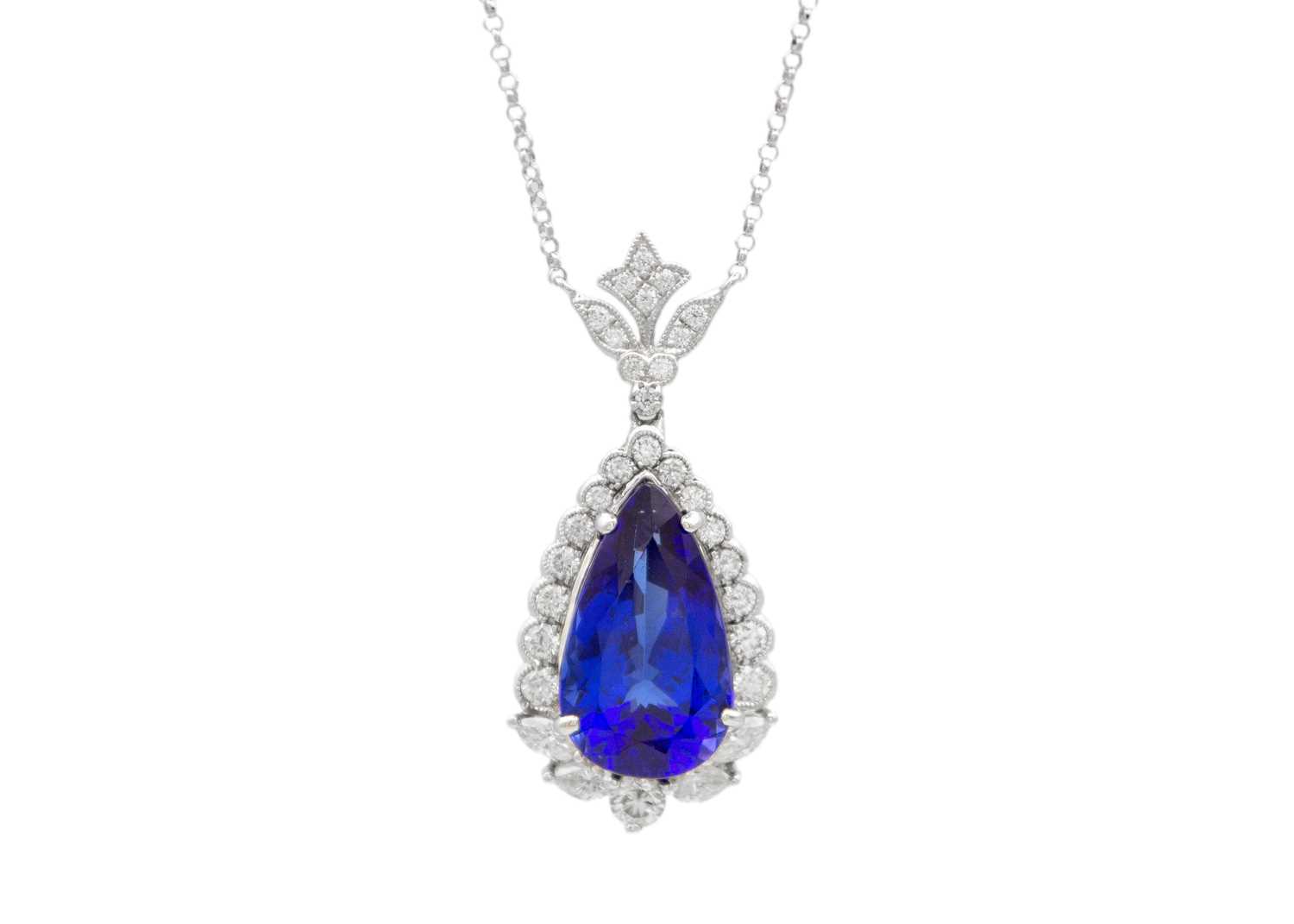 Lot 111 - An impressive pear-shaped Tanzanite pendant necklace in 18K white gold with diamonds.