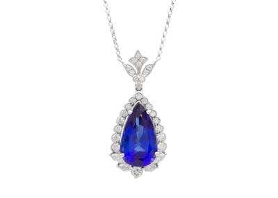 Lot 111 - An impressive pear-shaped Tanzanite pendant necklace in 18K white gold with diamonds.