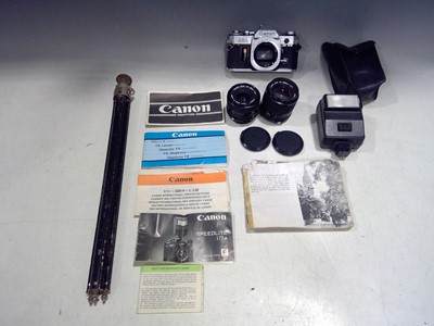 Lot 11 - A Canon AE-1 Body, a 28mm 1: 2.8, a 100mm...