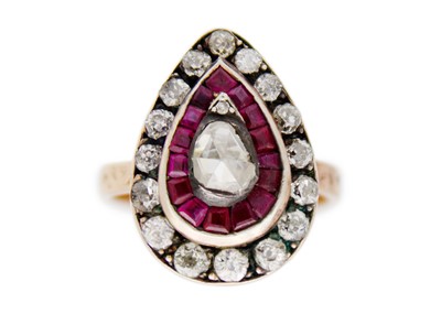 Lot 132 - A vintage style 8K rose gold ruby and diamond ring.