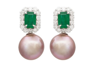 Lot 144 - A pair of 18K white gold emerald and pearl stud earrings.