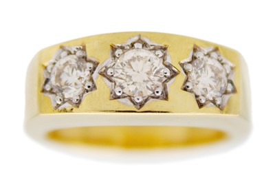 Lot 156 - A 9k yellow gold gipsy-style three-stone diamond ring.