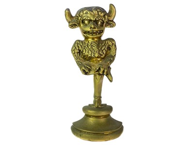 Lot 73 - A Victorian brass Lincoln imp door stop.