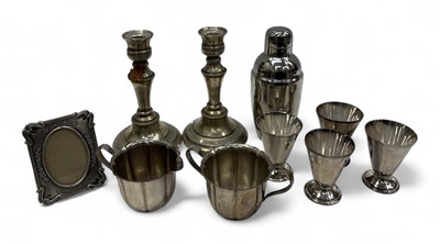 Lot 15 - A set of four Reed & Barton silver plated cups,...