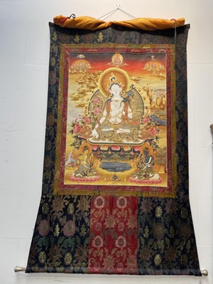 Lot 551 - A Tibetan Thangka depicting White Tara.