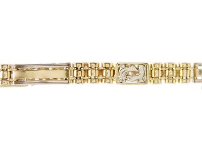 Lot 97 - A modern 14k two-tone gold (tested) bracelet.