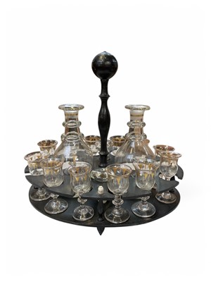 Lot 103 - A Victorian ebonised liqueur stand.