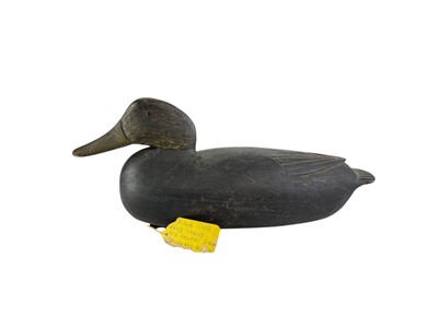 Lot 296 - An American black painted hollow duck decoy.