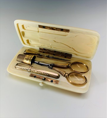 Lot 2563 - A 19th century French ivory etui with gold...