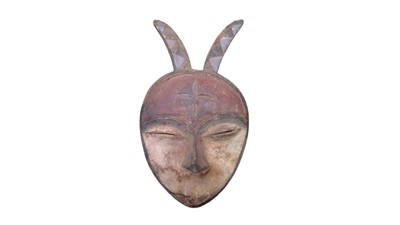 Lot 79 - An African carved wood antelope mask.