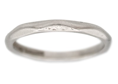 Lot 227 - A platinum band ring.