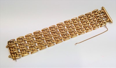 Lot 2560 - A 1950's 18ct gold braceletwith stands of...
