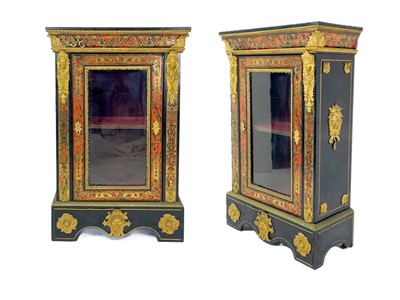 Lot 479 - A pair of 19th century gilt metal mounted boule and ebonised pier or side cabinets.