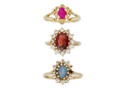 Lot 147 - A selection of three 9k gem set rings.