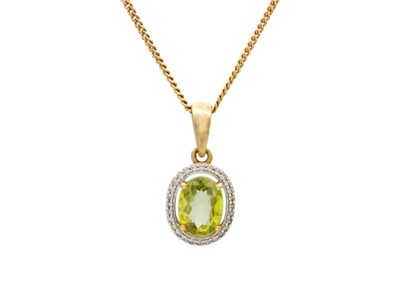 Lot 116 - A 9k gold green sphene and zircon halo pendant necklace.