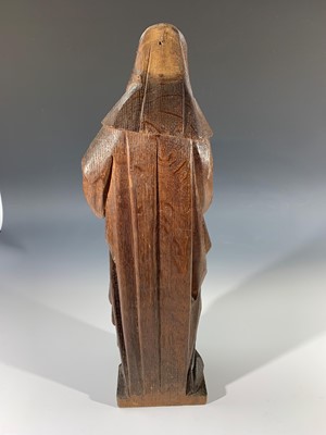Lot 76 - A wooden carving of the Madonna, height 56.5cm,...