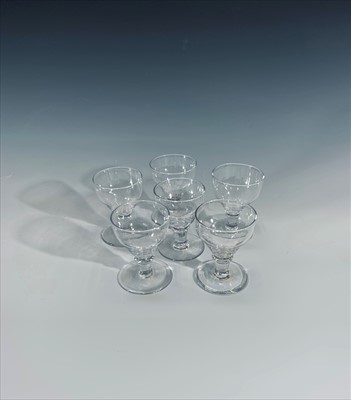 Lot 1055 - A suite of Georgian style table glass with...